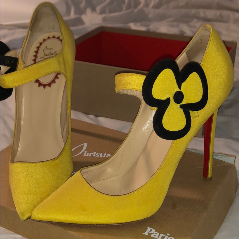 Christian Louboutin yellow and black heels